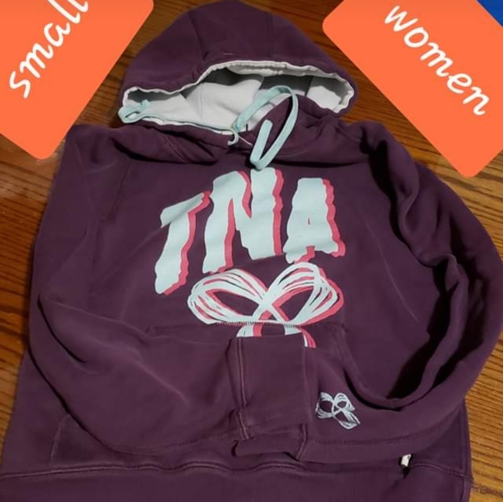 TNA Sweaters on hood
